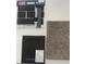Selection of interior materials, including carpet, cabinet, brick, and countertops at 4739 E Shadowbrook Dr, Camby, IN 46113