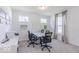 Office space with a large desk, multiple chairs, and natural light from the window at 4739 E Shadowbrook Dr, Camby, IN 46113
