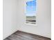 A bright bedroom with a large window offering a pleasant view at 5771 Cr W 750 N, McCordsville, IN 46055