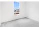 Bright bedroom with carpet, white walls and a window with a view of houses at 5771 Cr W 750 N, McCordsville, IN 46055
