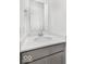 Stylish powder room features a gray vanity with a white countertop and a sleek, frameless mirror at 5771 Cr W 750 N, McCordsville, IN 46055