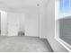 Bedroom featuring gray carpet, white walls, and natural light at 5777 Cr W 750 N, McCordsville, IN 46055