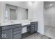 Luxurious bathroom with double vanity, ample counter space, and walk-in closet at 5785 Cr W 750 N, McCordsville, IN 46055