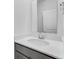 Modern bathroom with a white sink, gray vanity, and a sleek mirror at 5785 Cr W 750 N, McCordsville, IN 46055