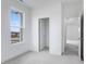 Bright bedroom featuring neutral carpeting, a window with natural light, and a closet at 5785 Cr W 750 N, McCordsville, IN 46055