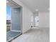 Bedroom with sliding glass door, leading to outdoor balcony at 5785 Cr W 750 N, McCordsville, IN 46055