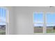Bright bedroom showcasing large windows and outside view at 5785 Cr W 750 N, McCordsville, IN 46055