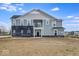 Beautiful two-story home with a balcony, stylish gray brick, and landscaped front yard at 5785 Cr W 750 N, McCordsville, IN 46055