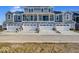 Exterior of townhomes with garages, driveways, and well-manicured lawns at 5785 Cr W 750 N, McCordsville, IN 46055
