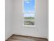 Natural light fills the room through a window that has a view of the expansive yard at 5785 Cr W 750 N, McCordsville, IN 46055
