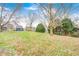 The spacious backyard has a swing and is perfect for outdoor activities and relaxation at 5984 Williams Dr, Plainfield, IN 46168