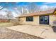 The home's stone exterior complements the large patio in the backyard, creating a charming outdoor space at 5984 Williams Dr, Plainfield, IN 46168