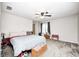 Spacious bedroom with ceiling fan, neutral carpet, and ample natural light from the window at 5984 Williams Dr, Plainfield, IN 46168