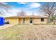 Charming stone ranch home with an attached garage and well-maintained front yard at 5984 Williams Dr, Plainfield, IN 46168