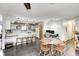 Modern kitchen and dining area featuring a large island and updated appliances at 5984 Williams Dr, Plainfield, IN 46168