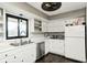 Updated kitchen features stainless steel appliances, ample cabinet space, and a bright window over the sink at 5984 Williams Dr, Plainfield, IN 46168