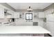 Bright, airy kitchen with ample cabinet space, stainless steel appliances, and modern fixtures at 5984 Williams Dr, Plainfield, IN 46168