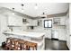 Updated kitchen with breakfast bar and stainless steel appliances, offering ample space for cooking and entertaining at 5984 Williams Dr, Plainfield, IN 46168