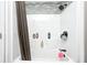 This shower boasts modern fixtures and built-in shelves for convenient storage at 5984 Williams Dr, Plainfield, IN 46168