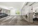 Bright parking garage with designated parking spaces and natural light from windows at 622 E 10Th St # 206, Indianapolis, IN 46202