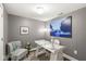 Home office featuring gray walls, a modern desk, comfortable seating, and elegant decor for a productive workspace at 622 E 10Th St # 206, Indianapolis, IN 46202