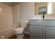 Cozy bathroom featuring a vanity, toilet, and shower-tub combo at 7081 Pate Hollow Dr, Brownsburg, IN 46112
