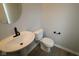Small bathroom offers a unique black faucet and hard surface flooring at 7081 Pate Hollow Dr, Brownsburg, IN 46112