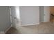 Spacious bedroom with neutral carpeting and an adjoining closet and door at 7081 Pate Hollow Dr, Brownsburg, IN 46112