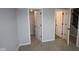 Neutral bedroom showing closet and doorways, with soft carpeting and fresh paint at 7081 Pate Hollow Dr, Brownsburg, IN 46112