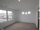 Bright, spacious bedroom with large windows, plush carpet, and natural light at 7093 Pate Hollow Dr, Brownsburg, IN 46112