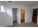 Bedroom showing walk in closet, adjoining bathroom, and natural light from windows at 7093 Pate Hollow Dr, Brownsburg, IN 46112
