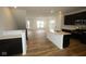 Modern kitchen with an island bar and stainless-steel appliances at 7093 Pate Hollow Dr, Brownsburg, IN 46112