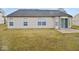 This backyard features a grassy area and a patio at 788 Tulip Ln, Greenwood, IN 46143