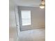 This bedroom features a ceiling fan and a window for natural light at 788 Tulip Ln, Greenwood, IN 46143