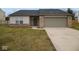 Charming single-Gathering home with a two-car garage, brick accents, and a well-maintained lawn at 788 Tulip Ln, Greenwood, IN 46143
