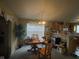 Casual dining area featuring a round table, wooden chairs, and natural lighting at 8033 Lake Tree Cir, Indianapolis, IN 46217