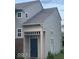 Charming home featuring a covered front porch and neutral siding at 8033 Lake Tree Cir, Indianapolis, IN 46217