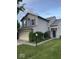 Charming two-story home with a two-car garage and a well-maintained lawn at 8033 Lake Tree Cir, Indianapolis, IN 46217