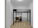 Bedroom featuring black steel bunkbed with desk and chair at 843 N Oxford St, Indianapolis, IN 46201