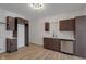Open kitchen featuring stainless steel appliances and wooden floor at 843 N Oxford St, Indianapolis, IN 46201
