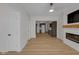 Inviting living room featuring hardwood floors, neutral walls, and a seamless transition to the kitchen at 843 N Oxford St, Indianapolis, IN 46201