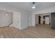 Spacious living room showcasing hardwood floors, neutral walls, and staircase access to the second floor at 843 N Oxford St, Indianapolis, IN 46201