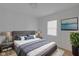 Serene main bedroom features soft lighting, plush bedding, and elegant decor at 843 N Oxford St, Indianapolis, IN 46201