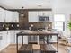 Bright kitchen with stainless steel appliances, and center island at 928 E Pleasant Run Parkway North Dr, Indianapolis, IN 46203