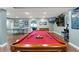 Basement rec room with billiard table, ping pong table, foosball, and arcade games at 9398 W Mirror Rd, Columbus, IN 47201