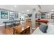 Open concept basement with hardwood floors, a ping pong table, and foosball table for entertainment at 9398 W Mirror Rd, Columbus, IN 47201