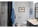 Bathroom featuring a walk-in shower, vanity with sink, and nautical-themed decor at 9398 W Mirror Rd, Columbus, IN 47201