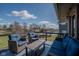 Spacious deck with comfortable seating and scenic views of the lake at 9398 W Mirror Rd, Columbus, IN 47201