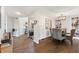 Dining room featuring hardwood floors, modern lighting, and neutral paint; great for entertaining and gatherings at 9398 W Mirror Rd, Columbus, IN 47201