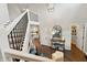 Grand foyer with hardwood floors, staircase, and views into other rooms at 9398 W Mirror Rd, Columbus, IN 47201